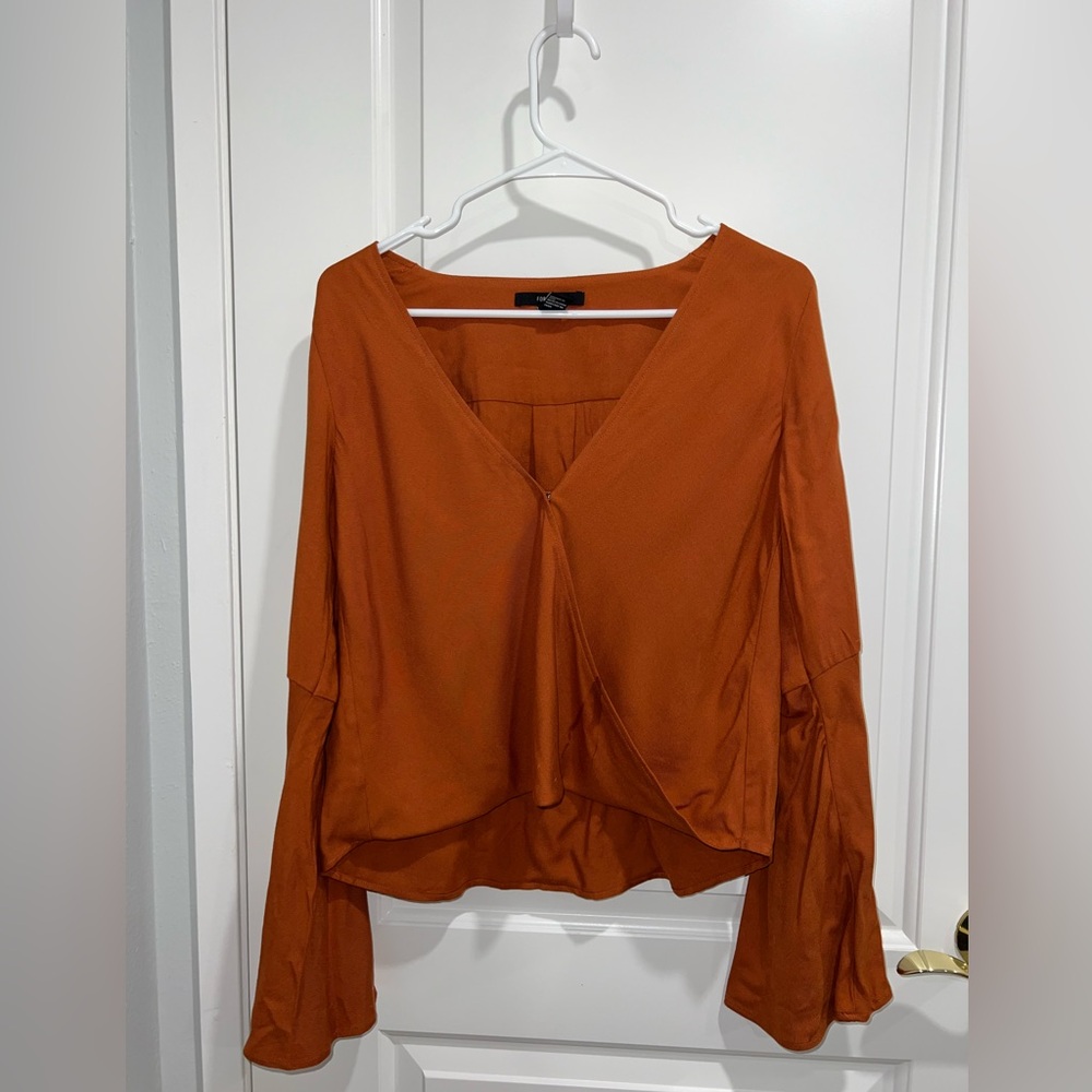 Burnt orange flowy blouse